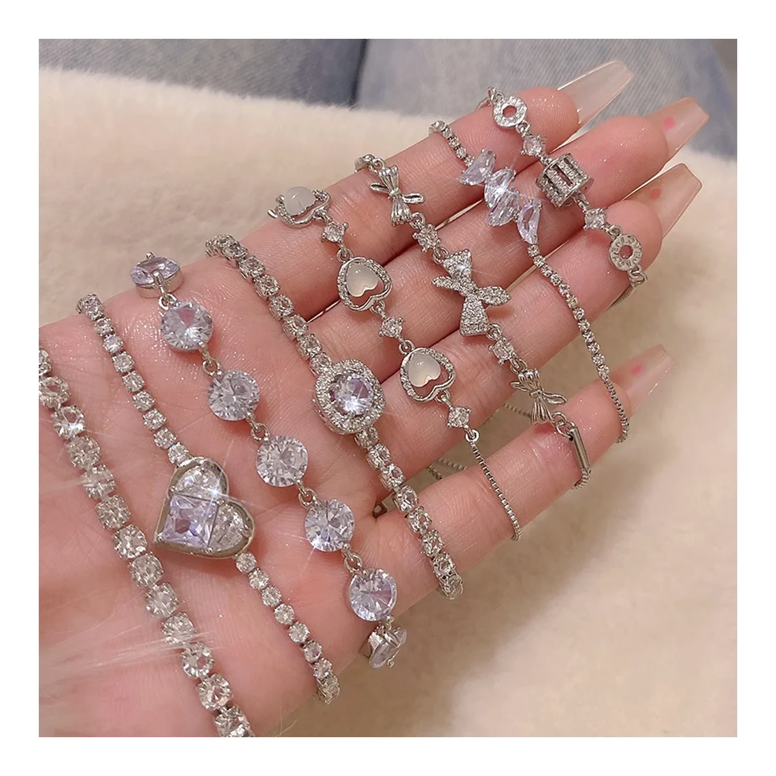 ខ្សែដៃគុជខ្យងកូរ៉េ niche versatile high-end exquisite zircon love bracelet temperament bow bracelet