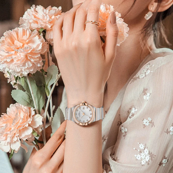 นาฬิกาข้อมือสุภาพสตรีสายเหล็กพร้อมปฏิทิน