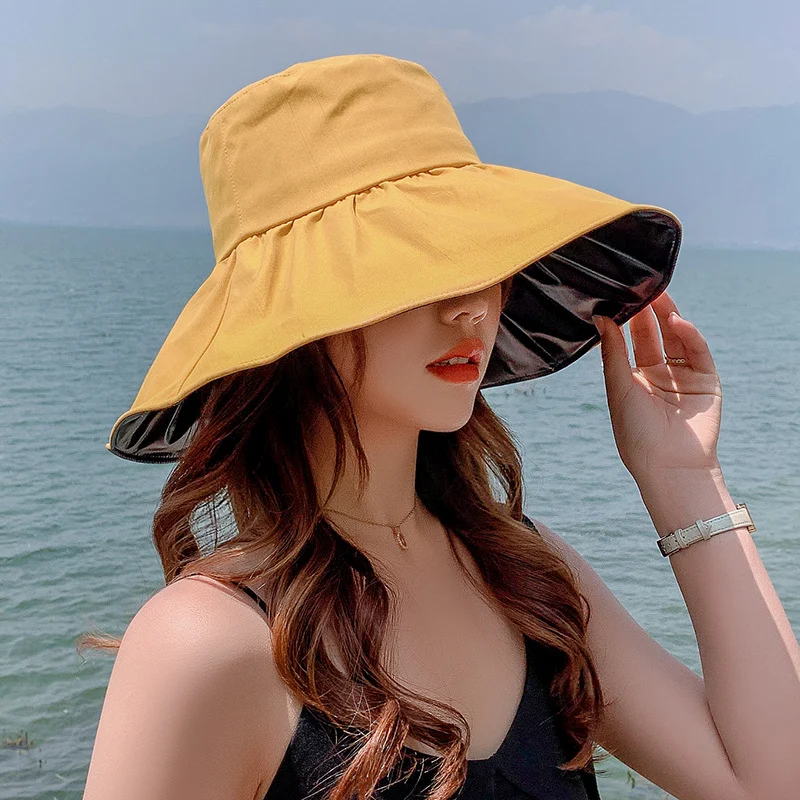 หมวกบัคเก็ตขายดี หมวกกันแดดปีกกว้างผ้าซาตินสีดำ ป้องกันรังสีอัลตราไวโอเลต หมวกกันแดดสำหรับผู้หญิง