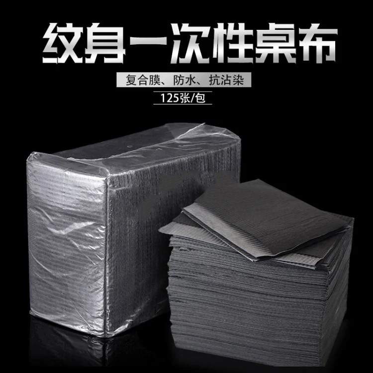 อุปกรณ์สักลายมังกรทอง อุปกรณ์สักคิ้ว ผ้าปูโต๊ะแบบใช้ครั้งเดียว ผ้าคลุมโต๊ะทำงานสีดำ กระดาษรองทำความสะอาดสำหรับทันตกรรม 125 แผ่น
